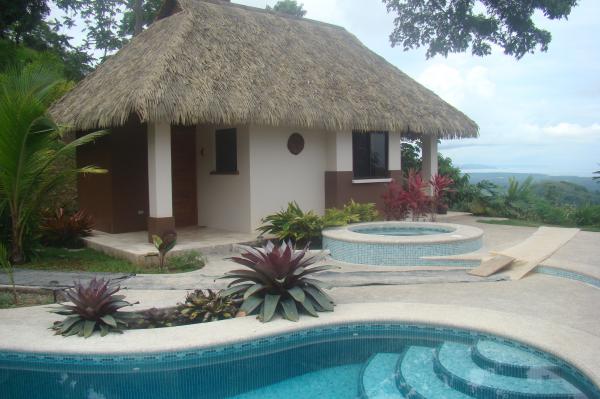 ojochal real estate, dominical real estate, polynesian style home, ocean view estate, 8.2 acres, home with pool, 3 structures, new home for sale