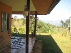 Plantanillo house for sale, farms for sale, dominical real estate, almost 10 acres, usable land, potential small development, 3 to 4 additional lots, creek, mountain and valley views, cool at night, views, back porch, simple design, family estate