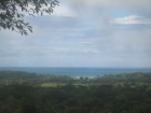 uvita real estate, easy access ocean view property, ocean view lot in uvita, close ot the road, close to the beach, finished building site, uvita property for sale