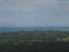 uvita real estate, easy access ocean view property, ocean view lot in uvita, close ot the road, close to the beach, finished building site, uvita property for sale